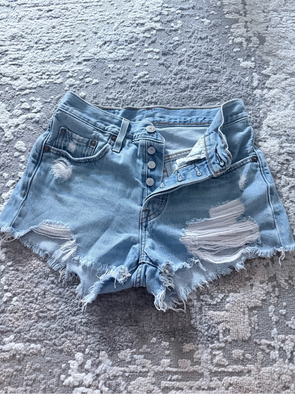 LEVI 501- Light Wash Distressed Denim (size 25)